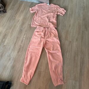 Adidas t shirt and sweat set in peach. Top is size S. Bottoms size M